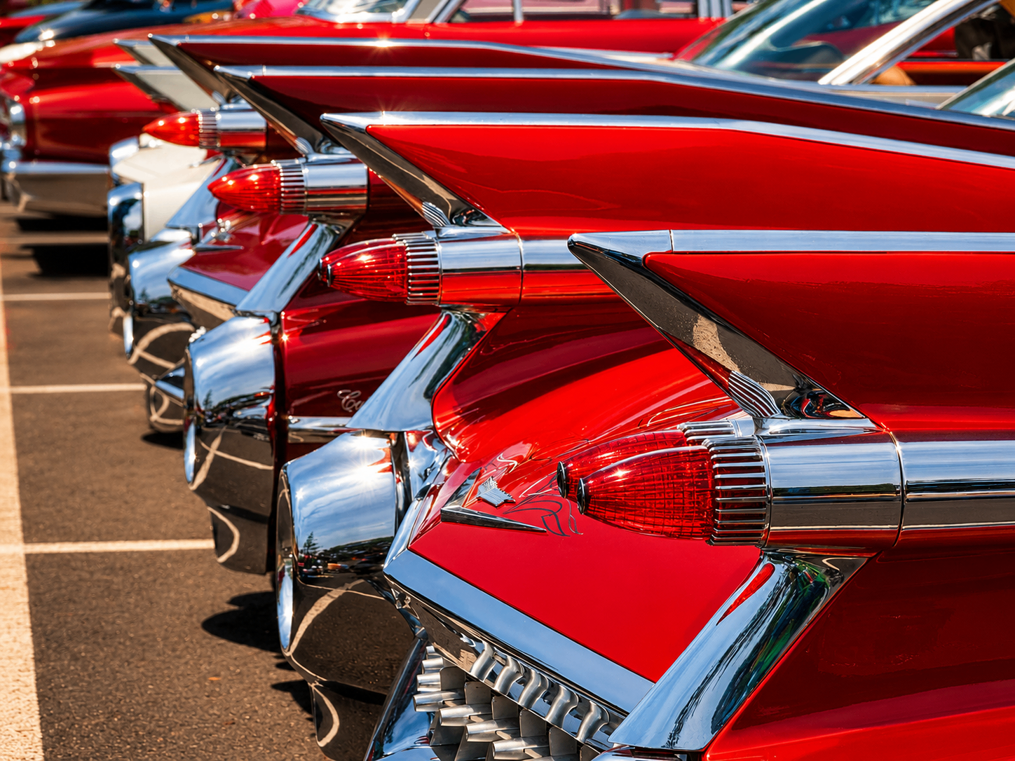 Row of red Cadillac tail fins