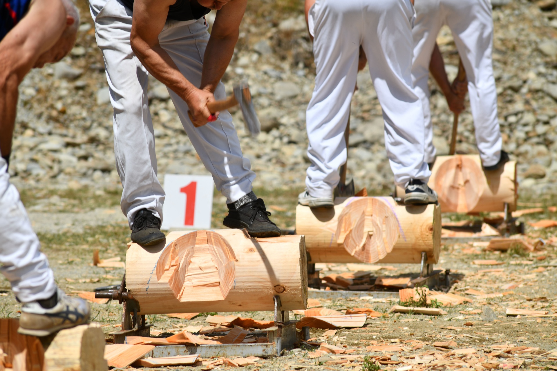 Woodchopper mid-swing during competition