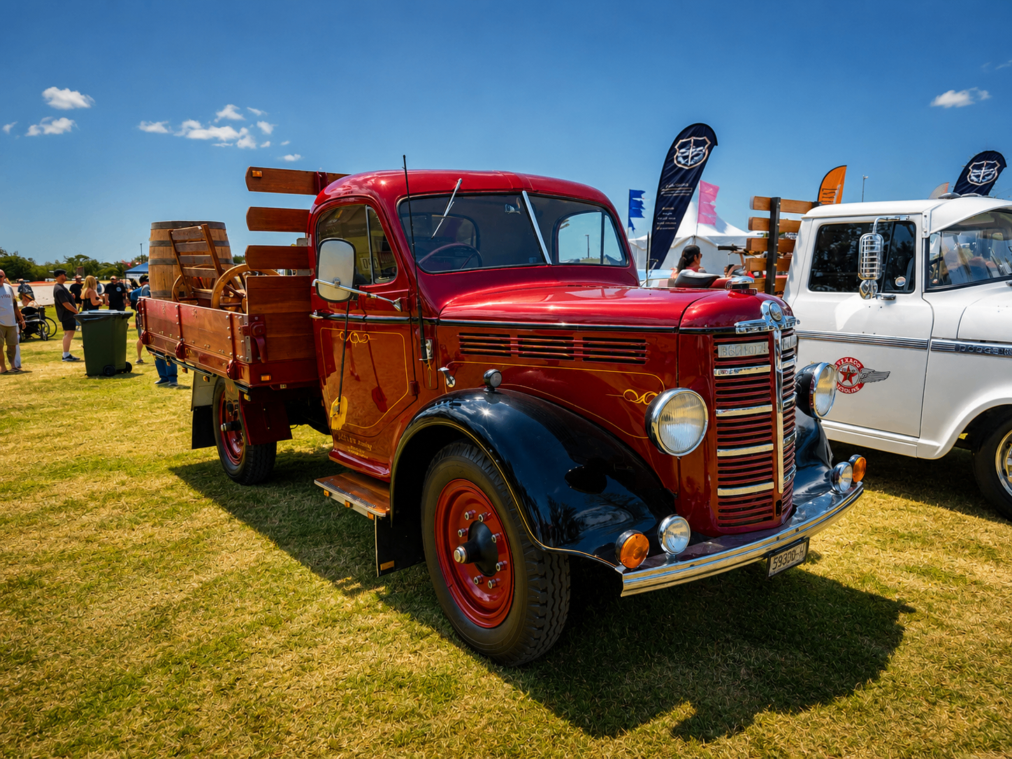 Restored vintage red truck on display